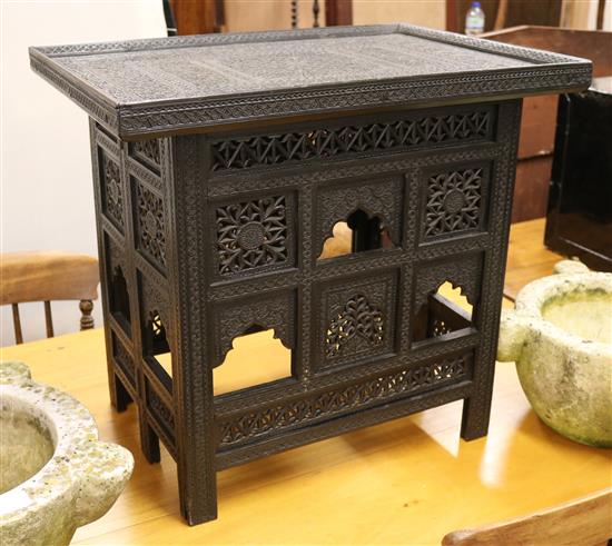 A Nagina ebony table W.61cm